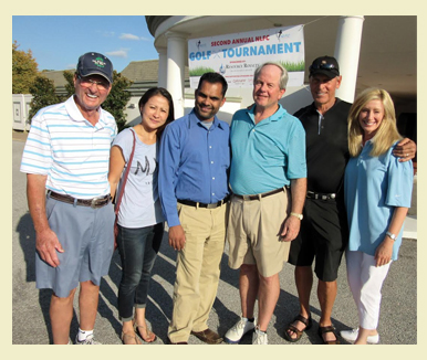 Grace Road Ministries golf tournament photo of sponsors and participants with dan and norola happy smiling people